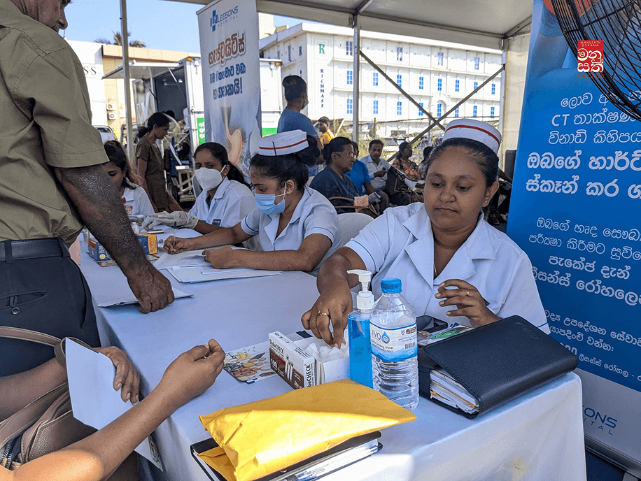 Community members receiving assistance and support from volunteers